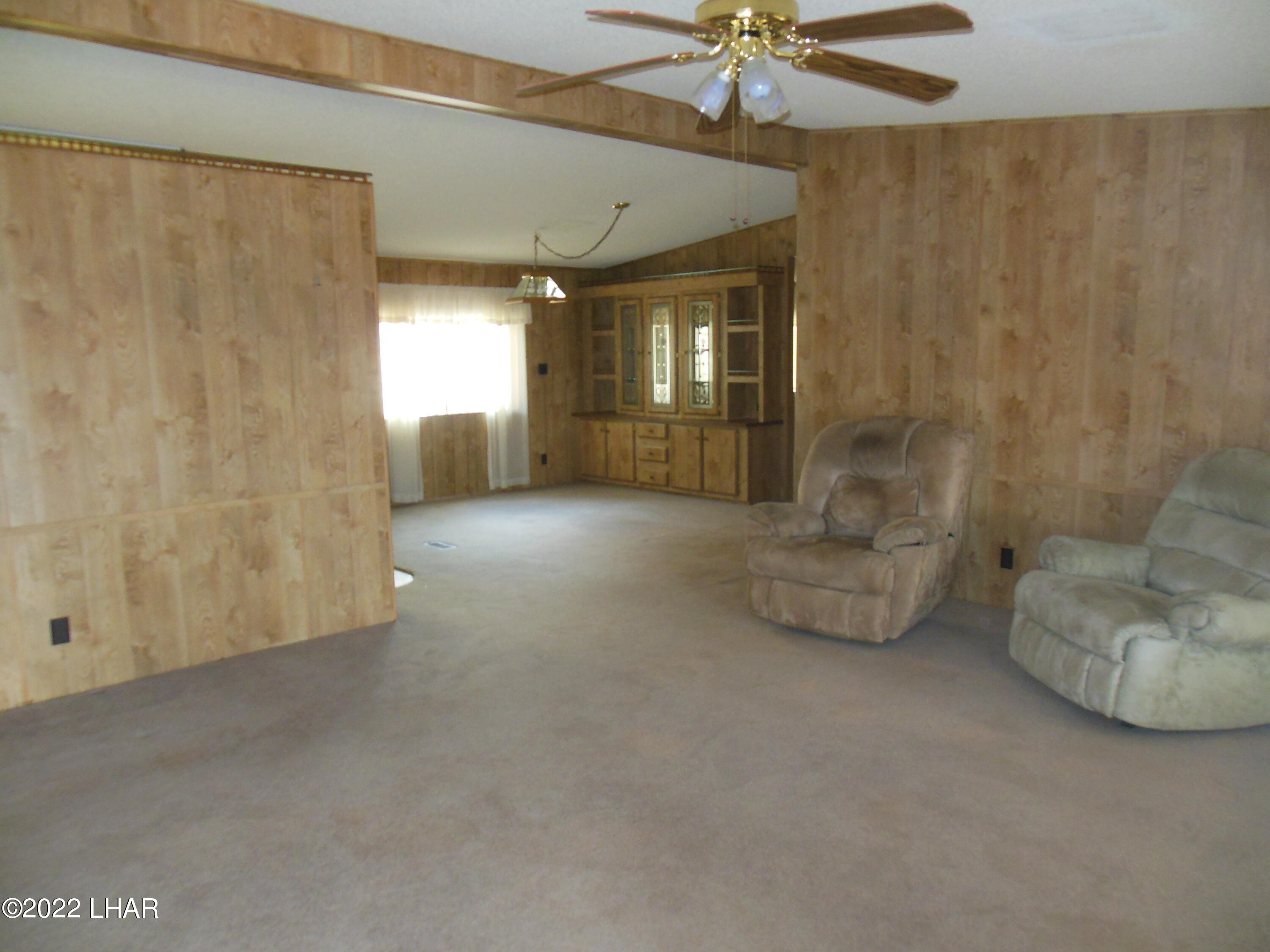 3744 North Bryce Road, Unit 54 Golden Valley, AZ 86413 - Photo 39 of 45 Front living room from front door