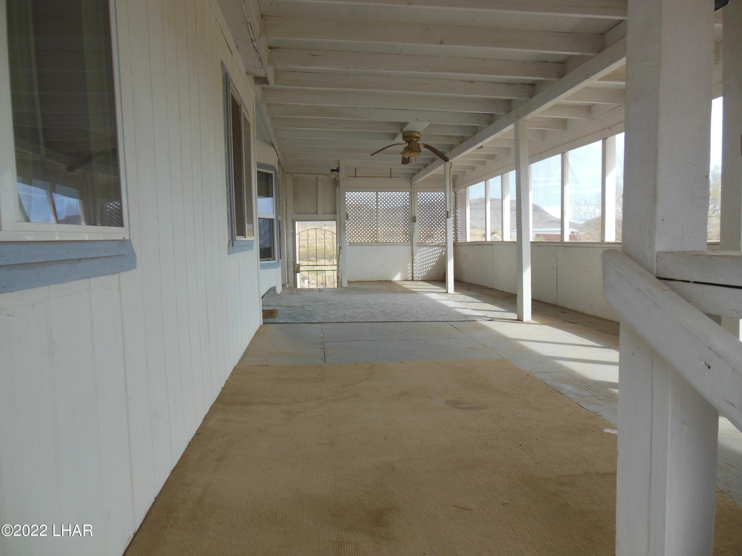 3744 North Bryce Road, Unit 54 Golden Valley, AZ 86413 - Photo 43 of 45 Another view coming into the screeded patio