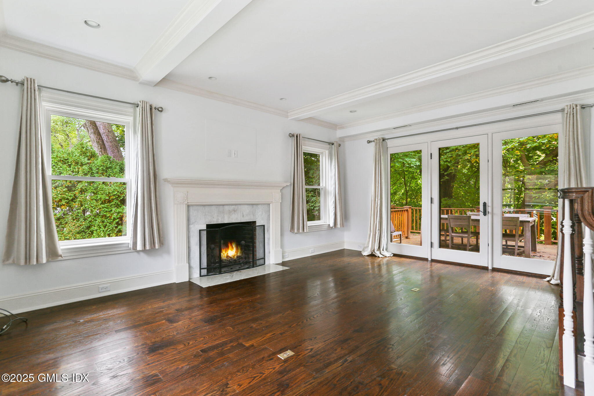 11 Harding Road Old Greenwich, CT 06870 - Photo 14 of 31 a view of an empty room with wooden floor and a window