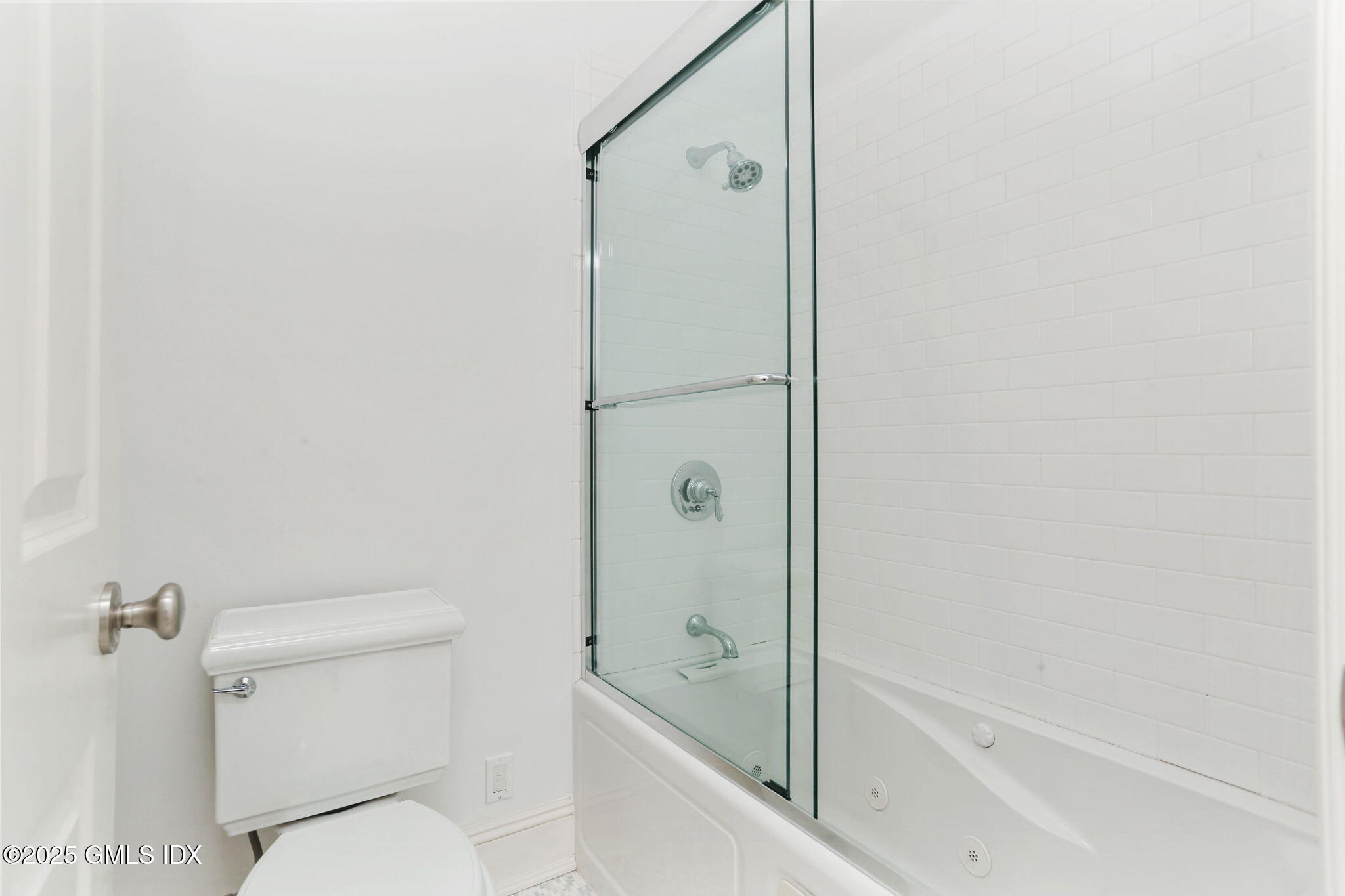 11 Harding Road Old Greenwich, CT 06870 - Photo 22 of 31 a bathroom with a granite countertop bathtub shower and toilet