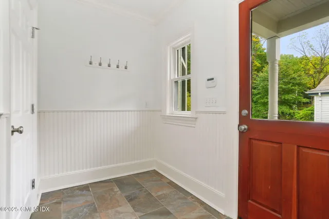 a view of an entryway with a window