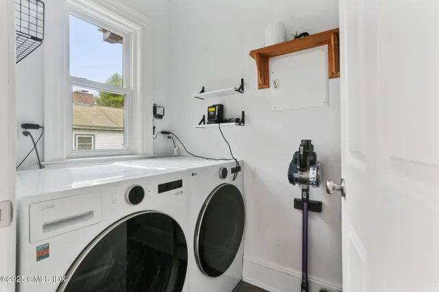 a utility room with dryer and washer