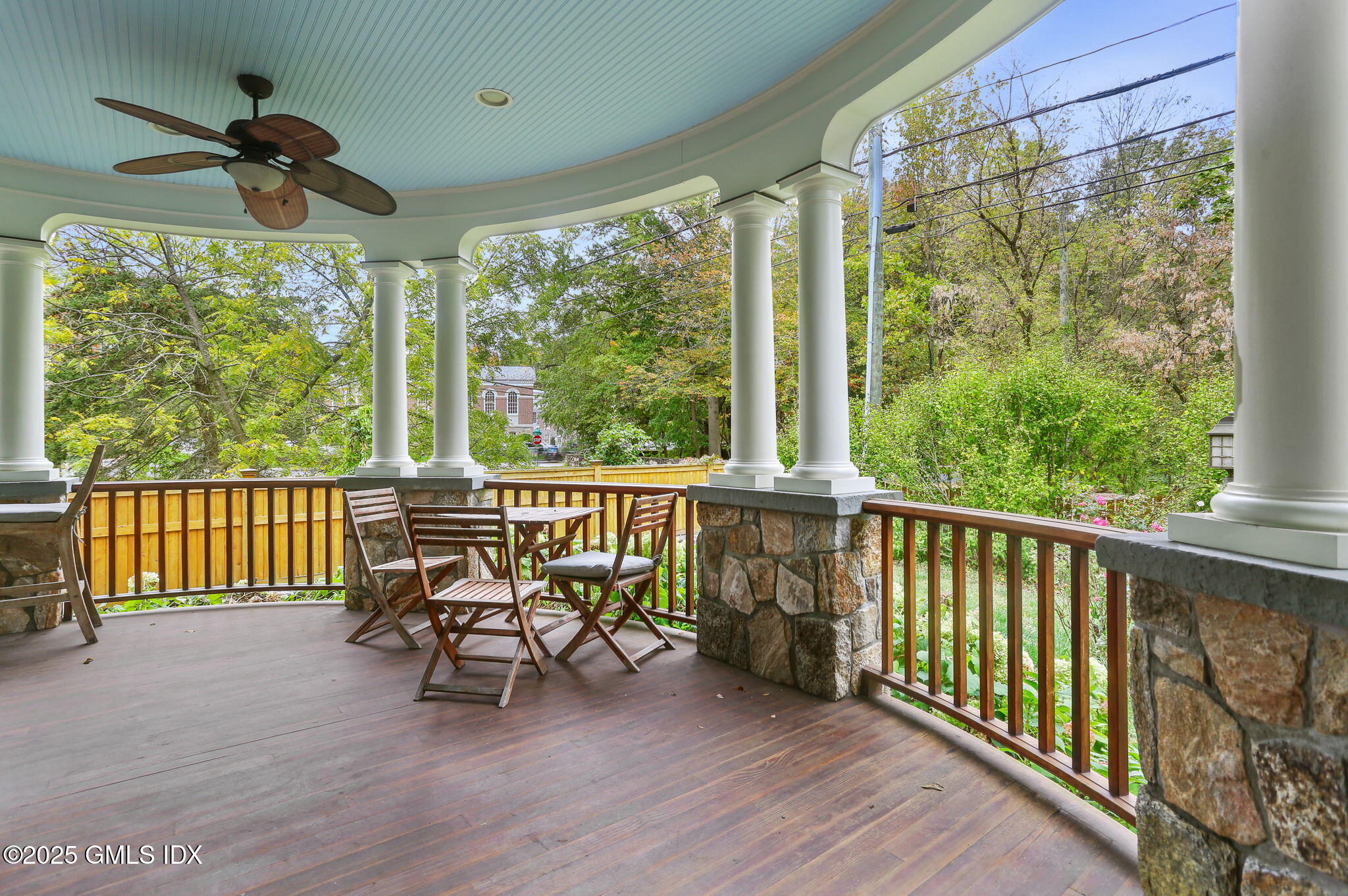 11 Harding Road Old Greenwich, CT 06870 - Photo 3 of 31 a view of a porch with furniture and wooden floor