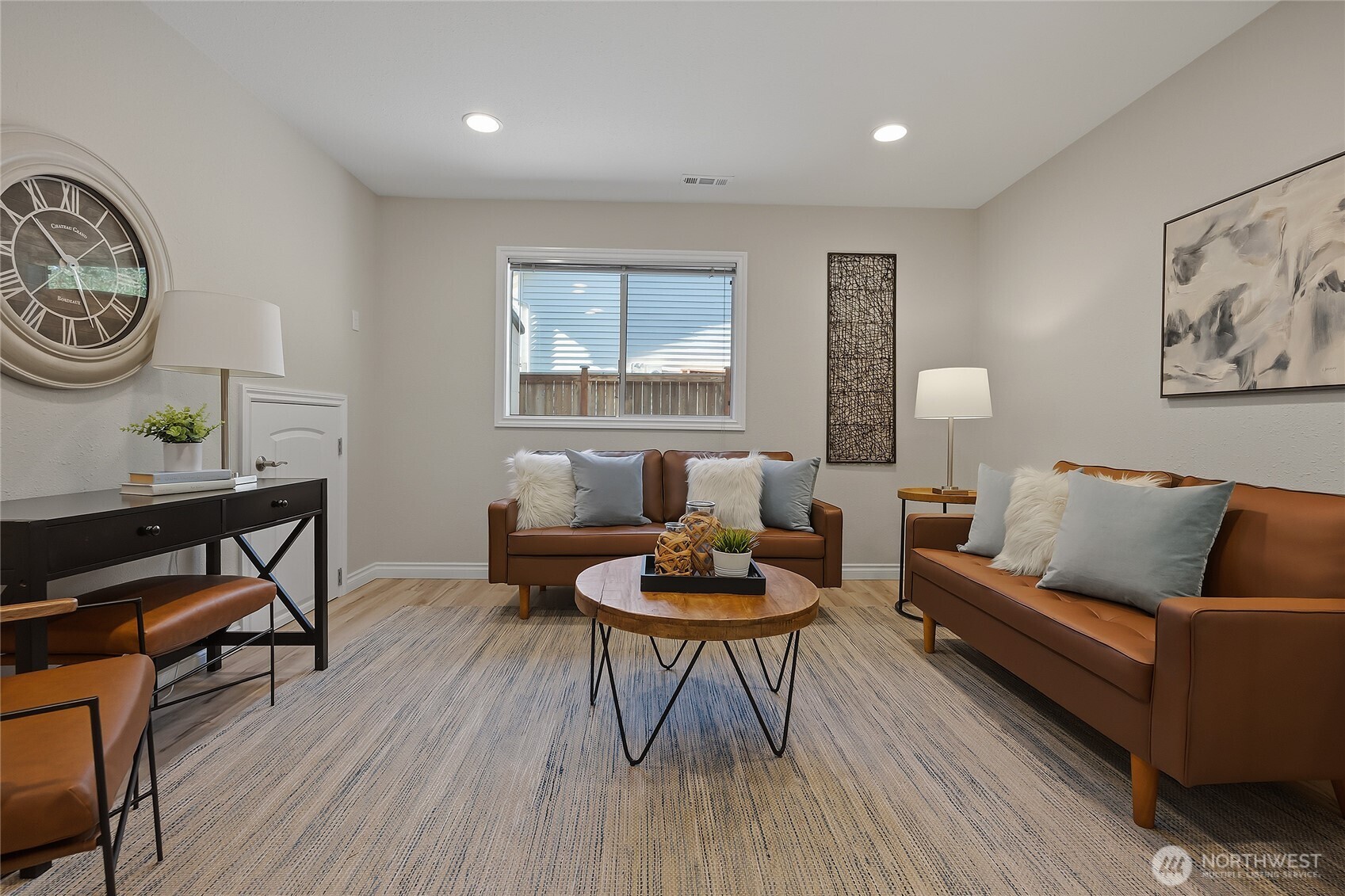 23707 Meridian Place West Bothell, WA 98021 - Photo 26 of 40 a living room with furniture and a wooden floor