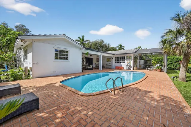 a view of a house with pool