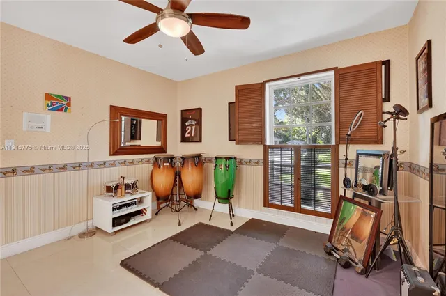 a view of a livingroom with furniture and a window