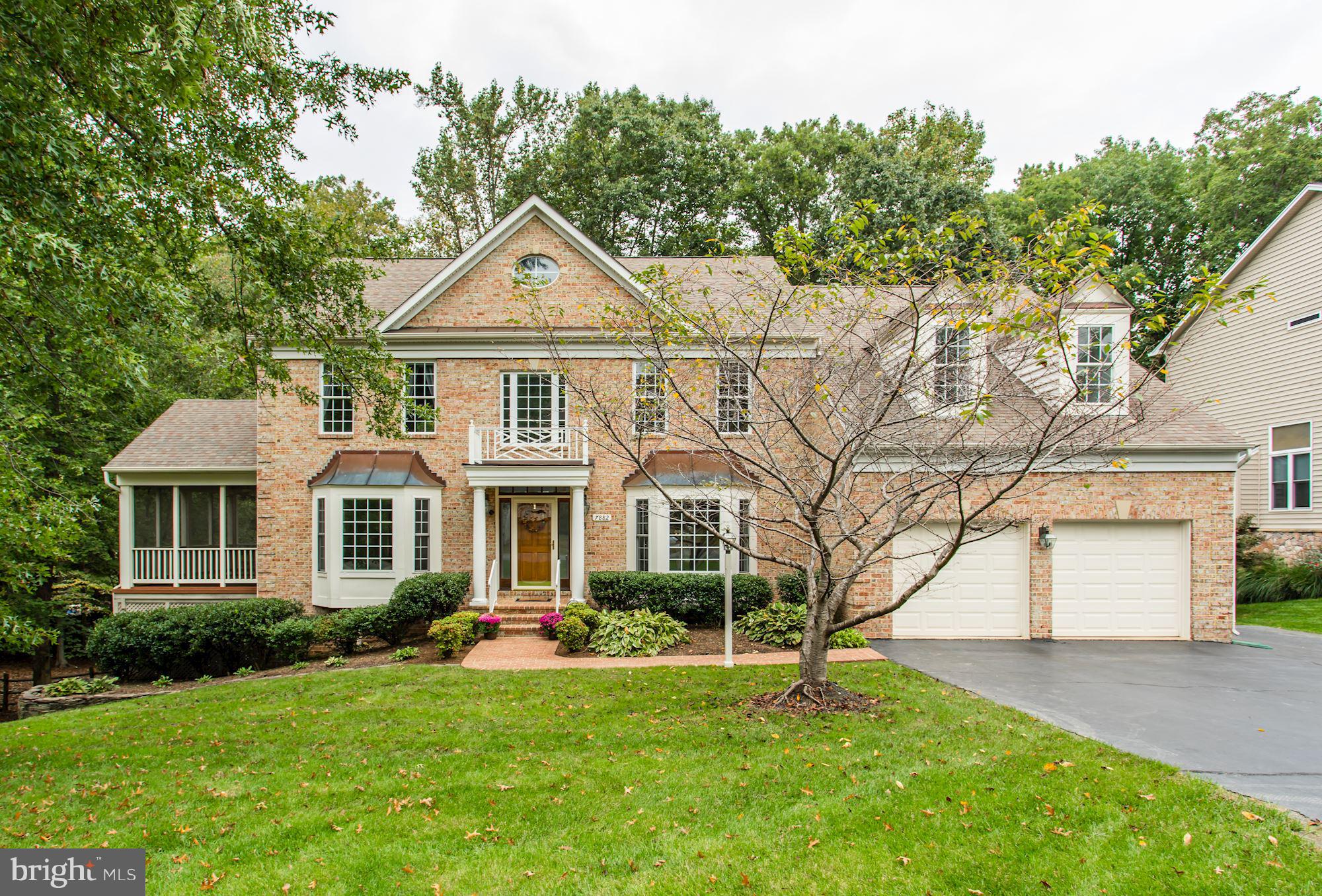 7882 Pembridge Road Manassas, VA 20112 - Photo 1 of 30 Brick Front w Decorative Railing over Wooden Door