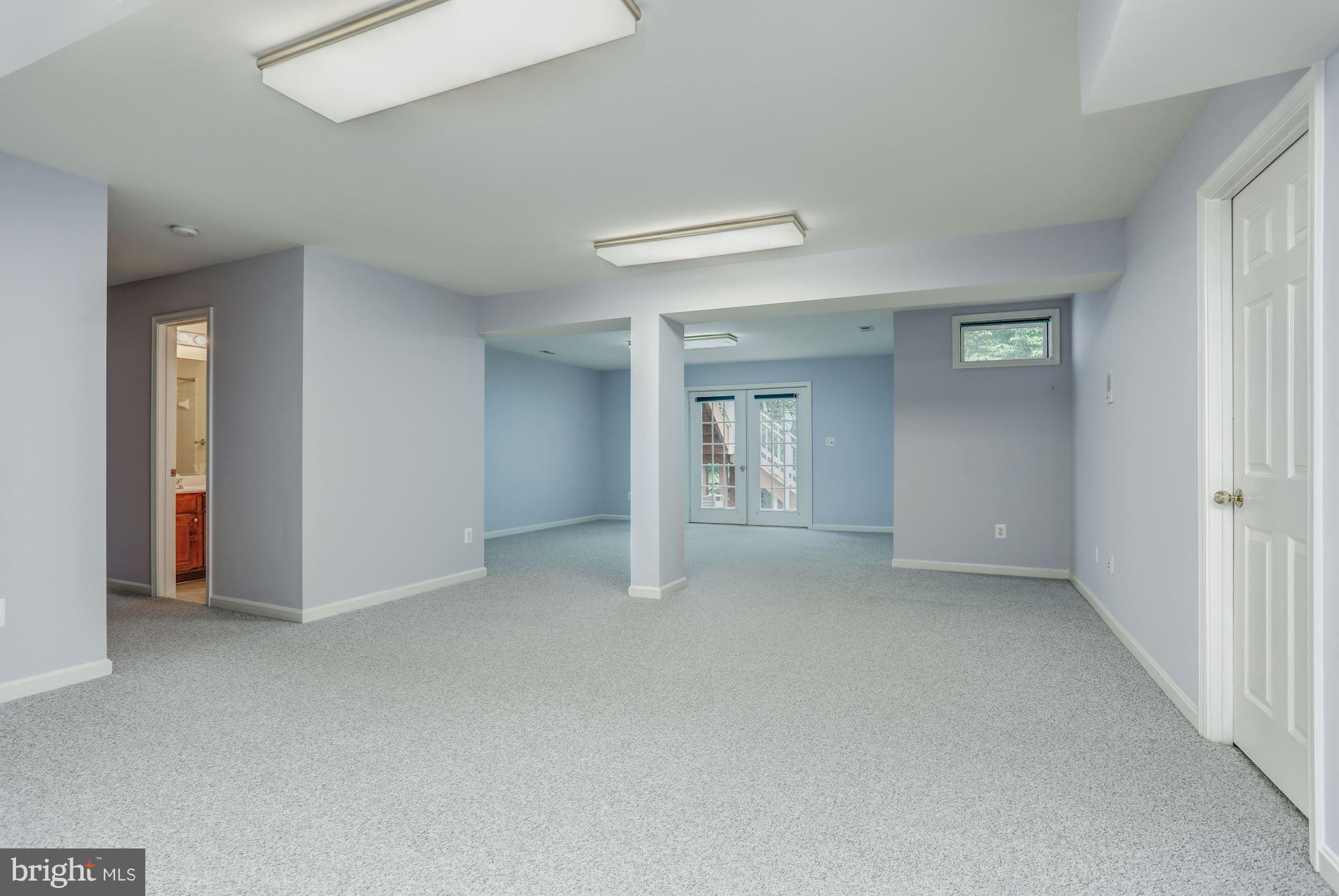 7882 Pembridge Road Manassas, VA 20112 - Photo 22 of 30 Lower Level Rec Room / Walkout