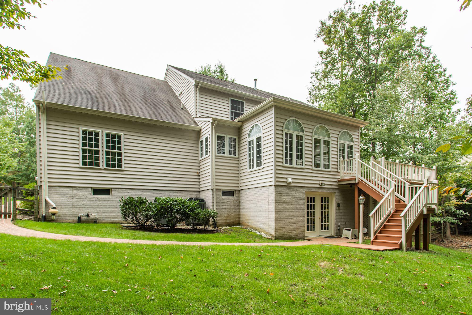 7882 Pembridge Road Manassas, VA 20112 - Photo 28 of 30 Walkout to Level Backyard and Stairs to Deck