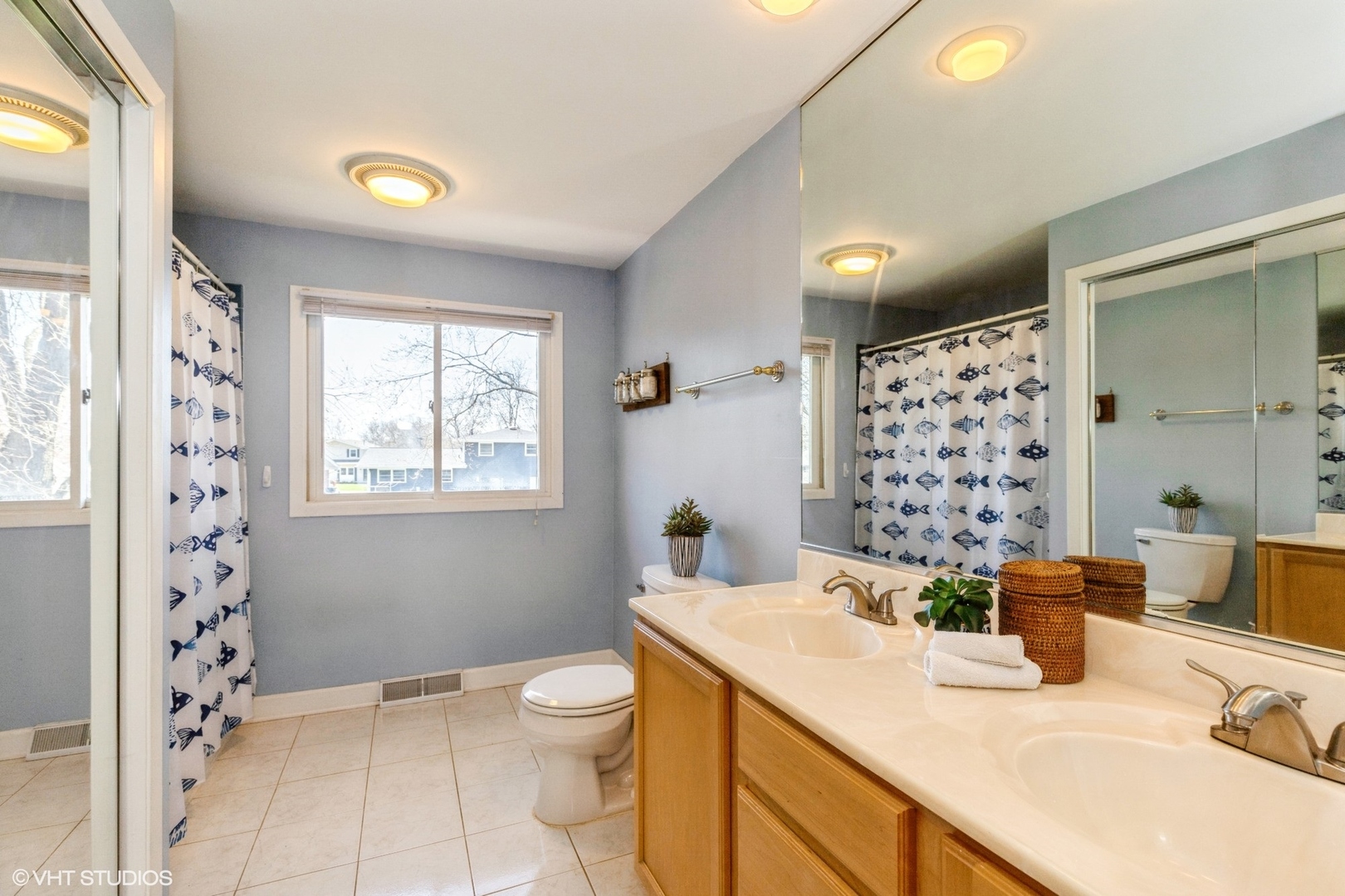 506 Beck Road Lindenhurst, IL 60046 - Photo 11 of 15 a bathroom with a sink toilet and shower