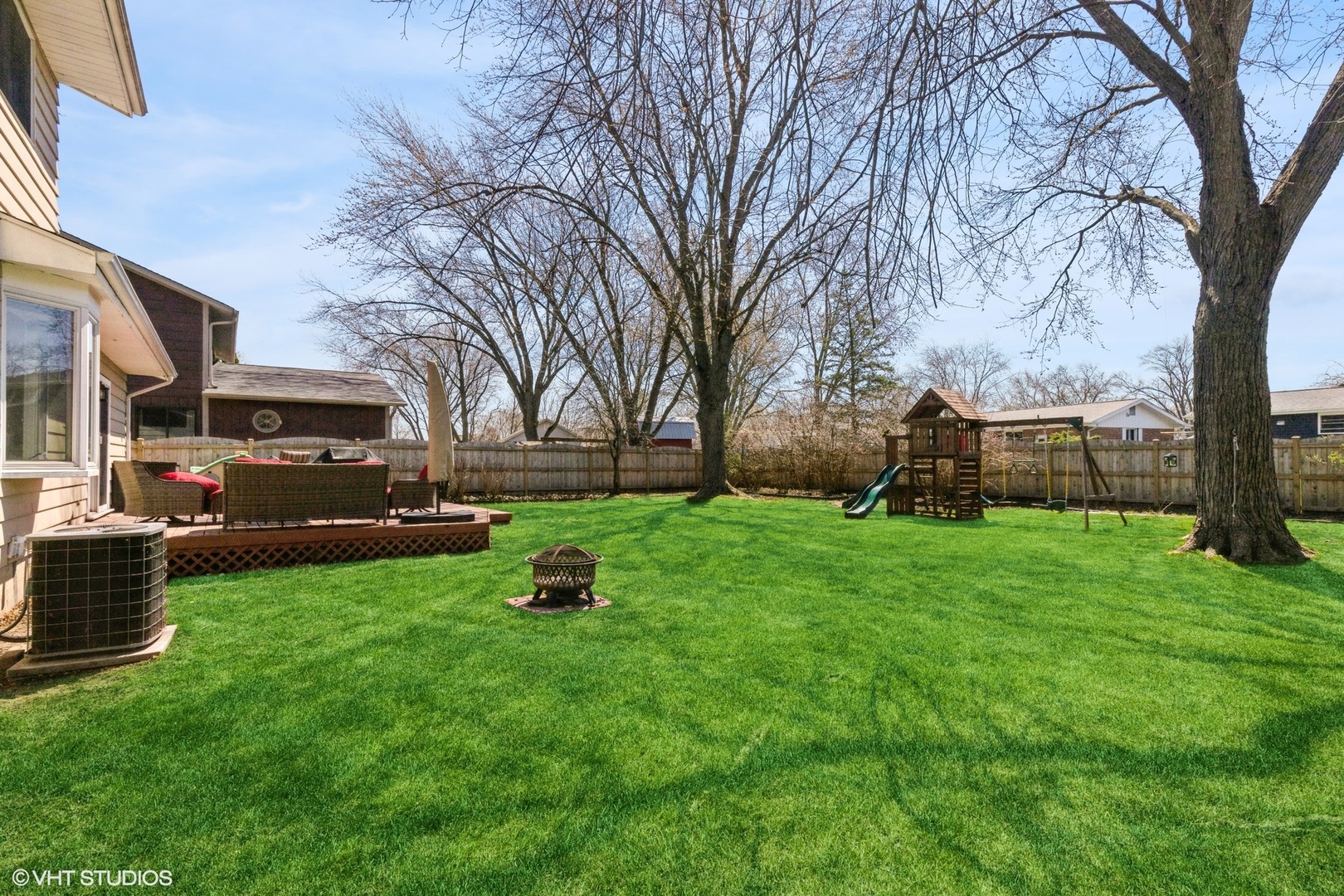 506 Beck Road Lindenhurst, IL 60046 - Photo 15 of 15 a view of a yard with cars parked