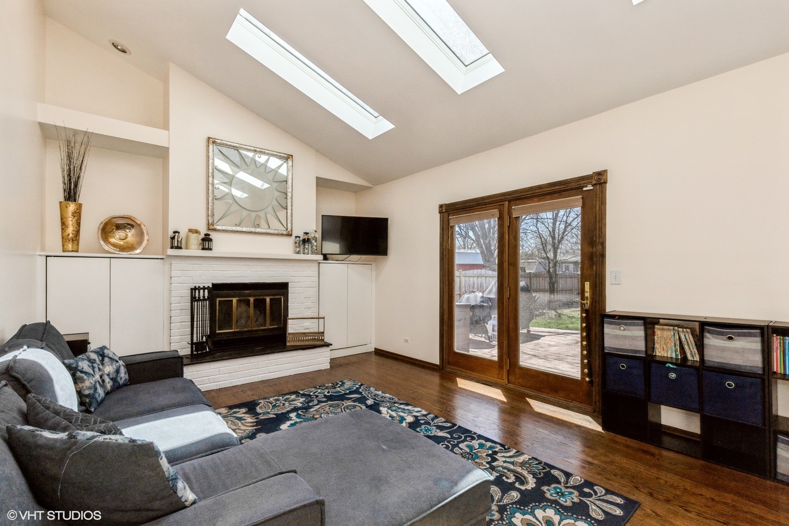 506 Beck Road Lindenhurst, IL 60046 - Photo 6 of 15 a living room with furniture and a fireplace