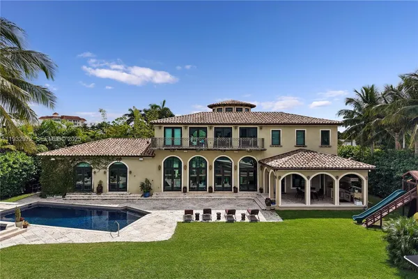 a bathroom with a sink toilet and mirror
