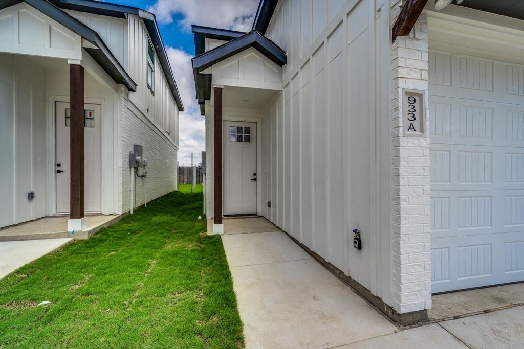 912 Cooksey Court, Unit B Grandview, TX 76050 - Photo 5 of 30 a view of small house with backyard