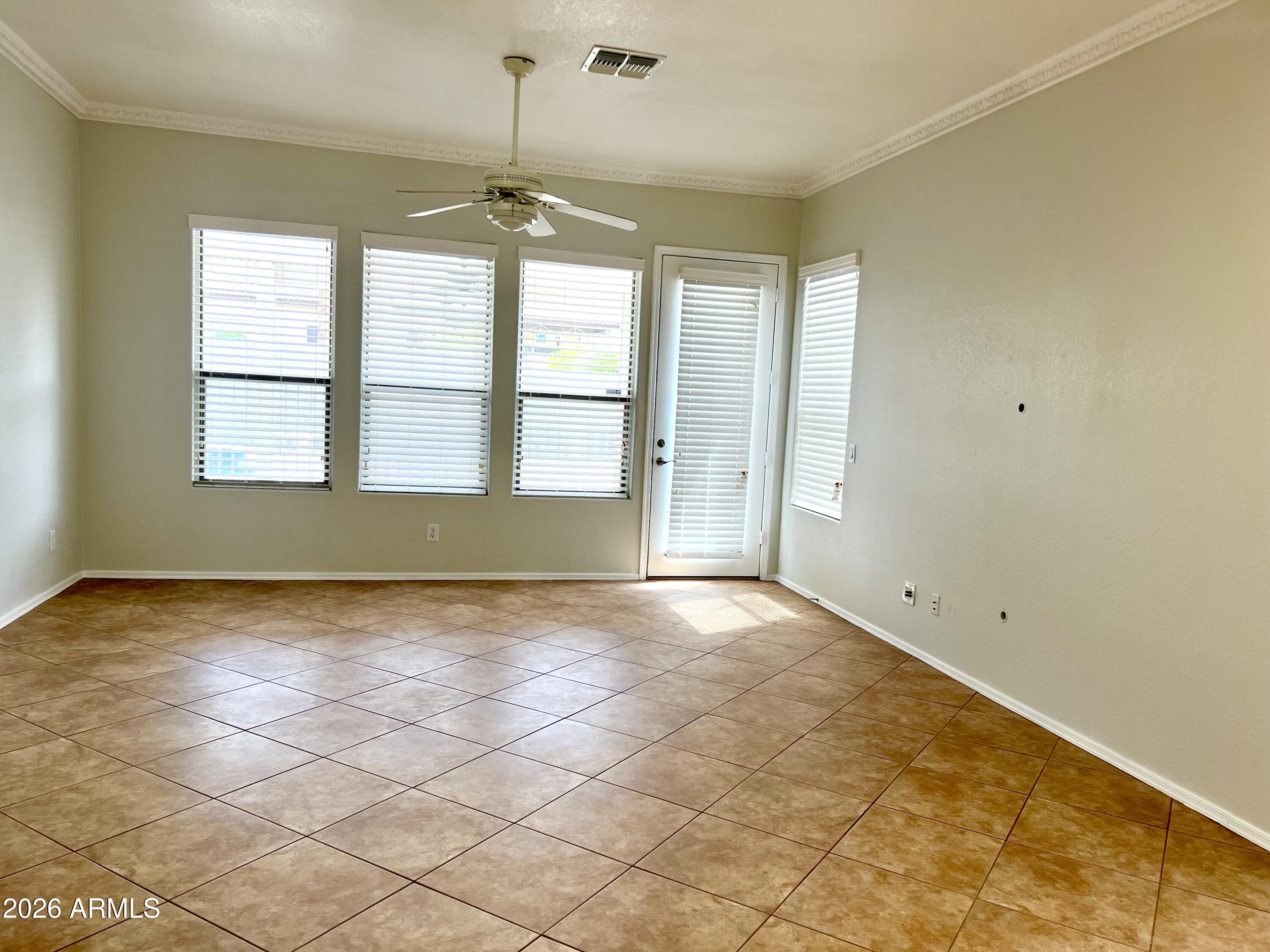 407 West Helena Drive Phoenix, AZ 85023 - Photo 6 of 35 a view of an empty room with a window