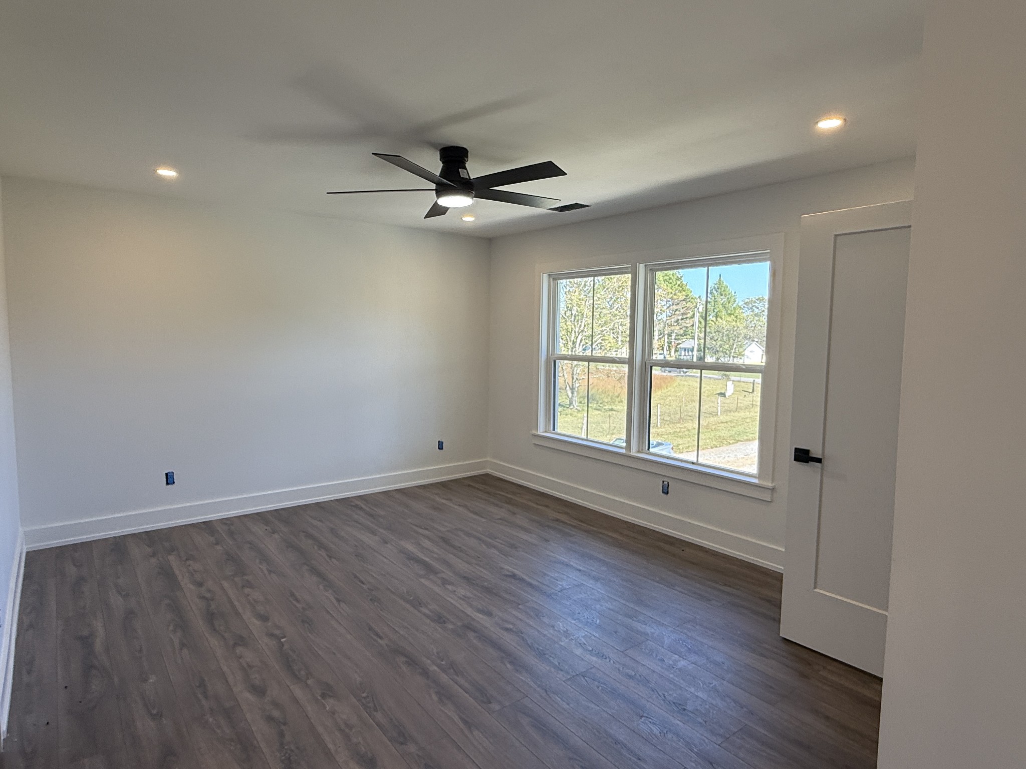 3880 Barfield Crescent Road Murfreesboro, TN 37128 - Photo 22 of 26 wooden floor in an empty room with a window