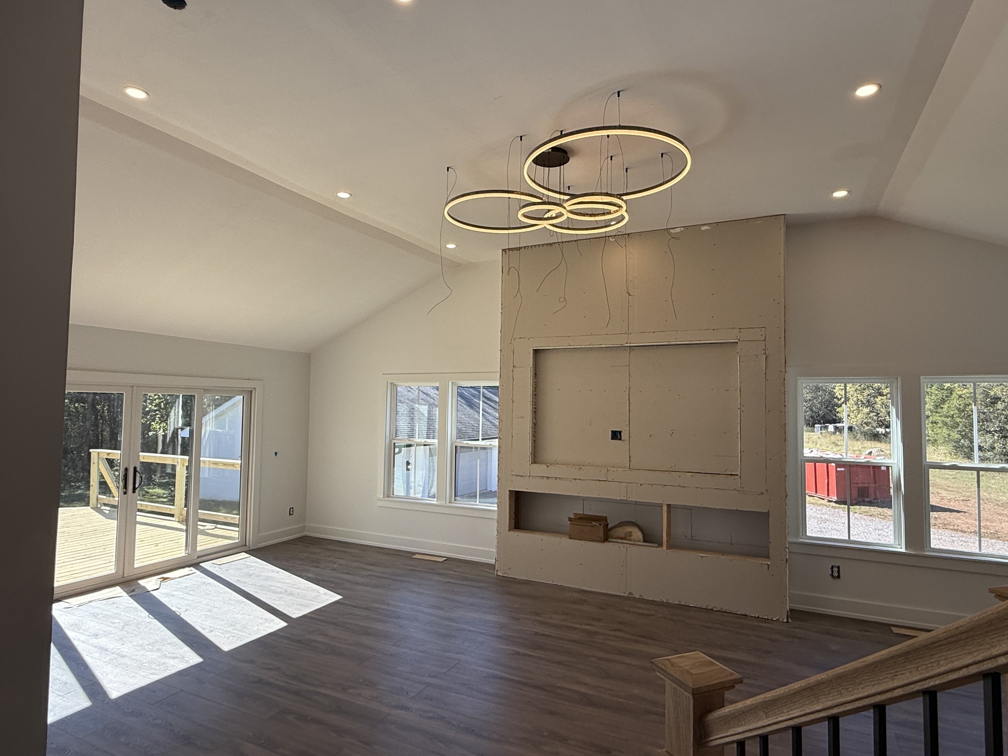 3880 Barfield Crescent Road Murfreesboro, TN 37128 - Photo 7 of 26 an empty room with wooden floor and windows