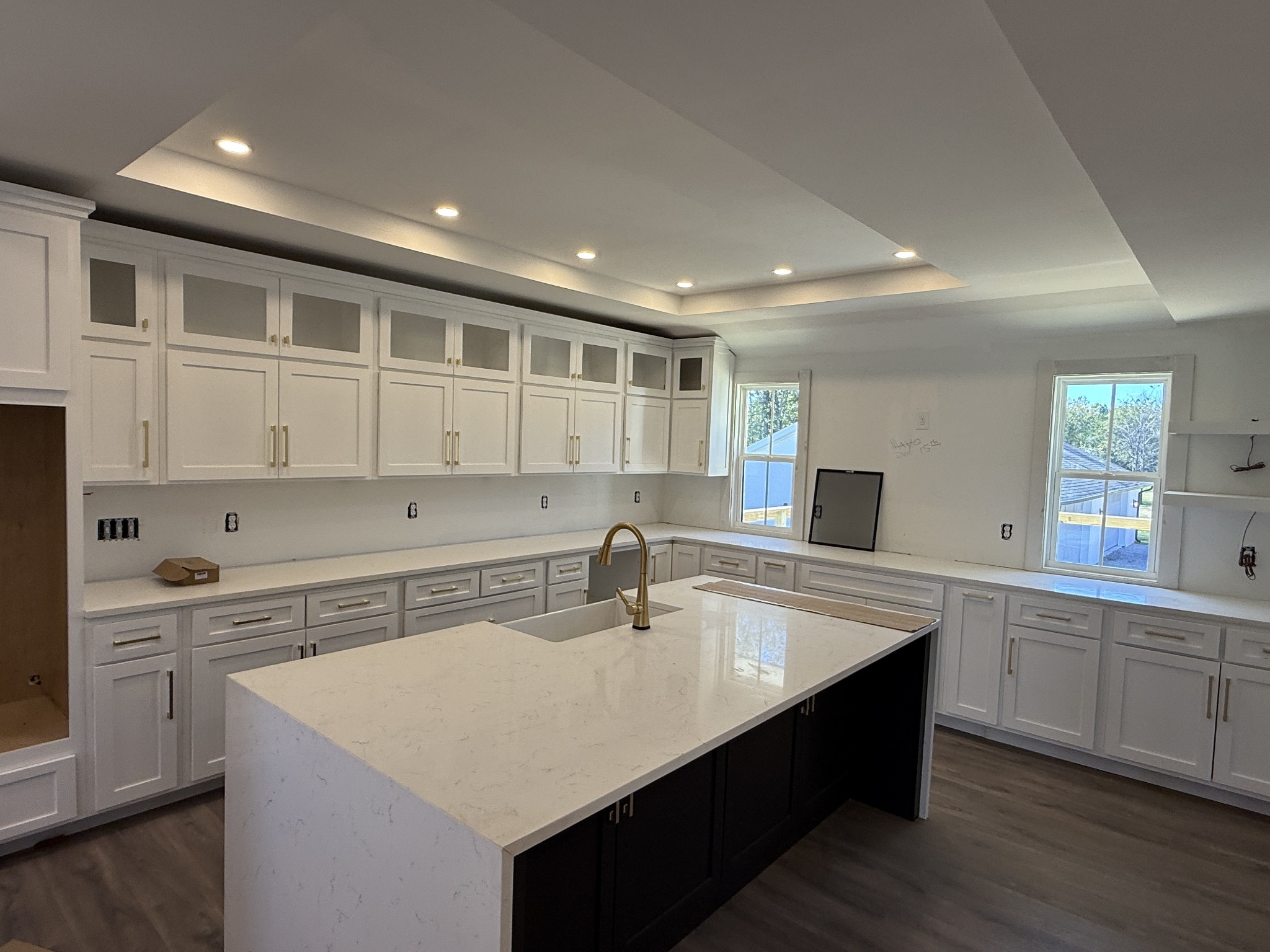 3880 Barfield Crescent Road Murfreesboro, TN 37128 - Photo 9 of 26 a kitchen with sink cabinets and wooden floor