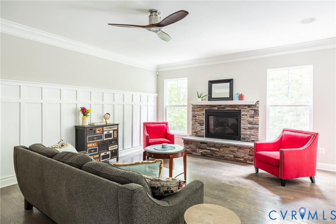 15206 Blackrail Road Chesterfield, VA 23832 - Photo 19 of 50 a living room with furniture or couch and a fireplace