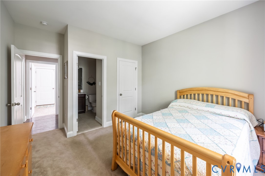 15206 Blackrail Road Chesterfield, VA 23832 - Photo 24 of 50 a bedroom with a bed and a table