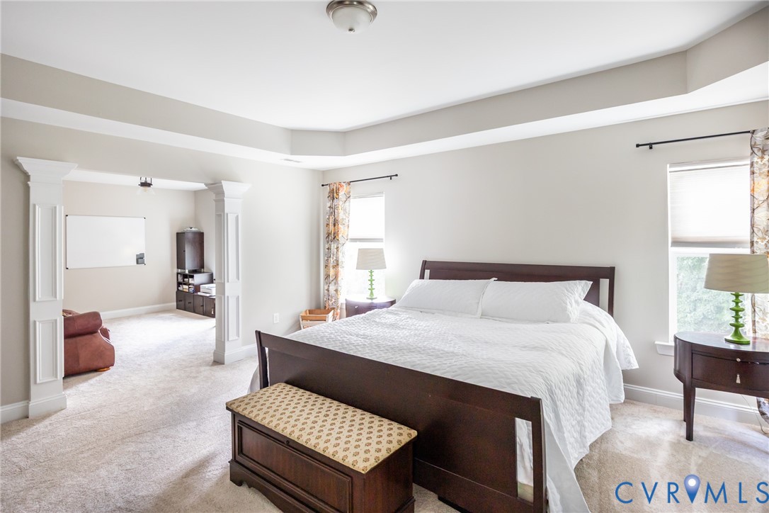 15206 Blackrail Road Chesterfield, VA 23832 - Photo 28 of 50 a large bedroom with a bed and window