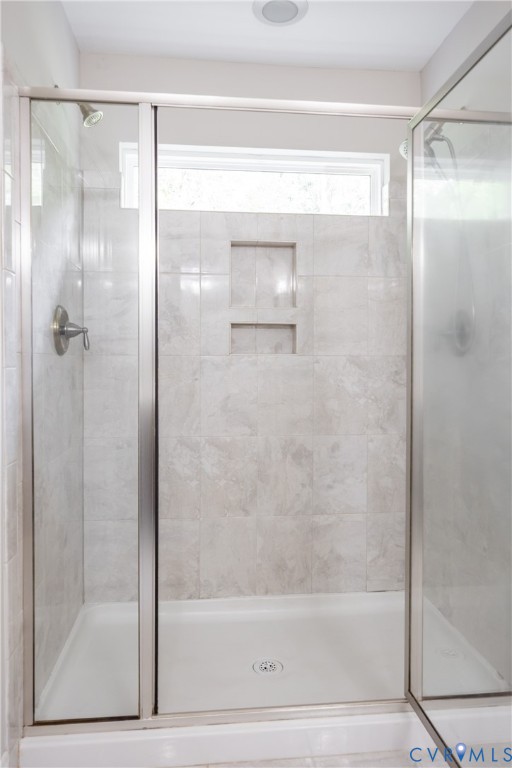 15206 Blackrail Road Chesterfield, VA 23832 - Photo 32 of 50 a bathroom with a glass shower door