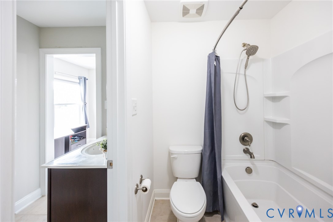 15206 Blackrail Road Chesterfield, VA 23832 - Photo 38 of 50 a bathroom with a sink a toilet and shower