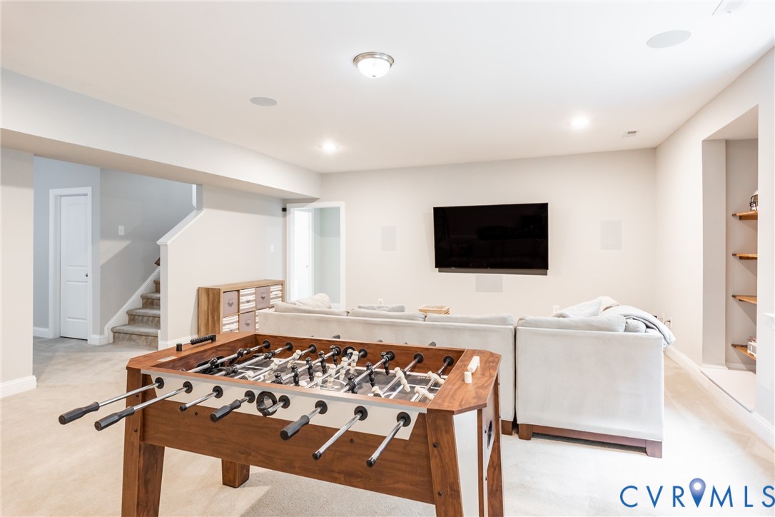 15206 Blackrail Road Chesterfield, VA 23832 - Photo 41 of 50 a living room with a flat screen tv and a rug