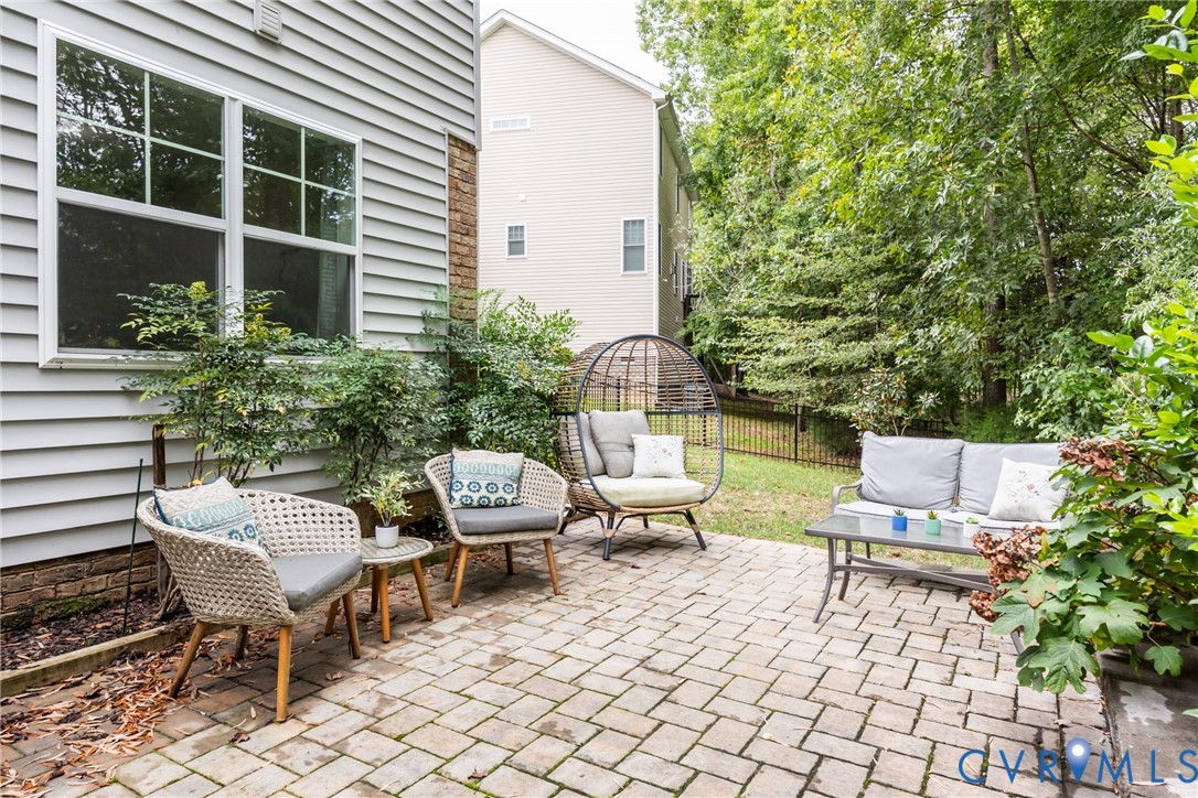 15206 Blackrail Road Chesterfield, VA 23832 - Photo 9 of 50 a view of a patio with chairs and plants