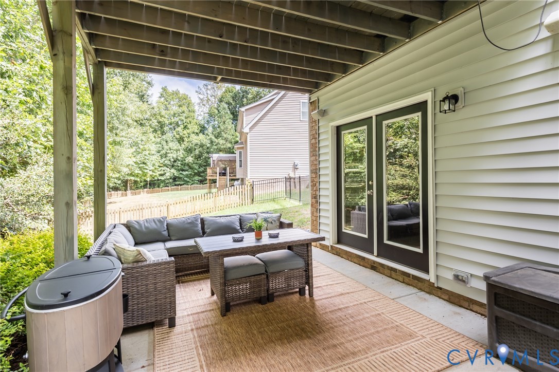 15206 Blackrail Road Chesterfield, VA 23832 - Photo 10 of 50 a living room with furniture and a large window