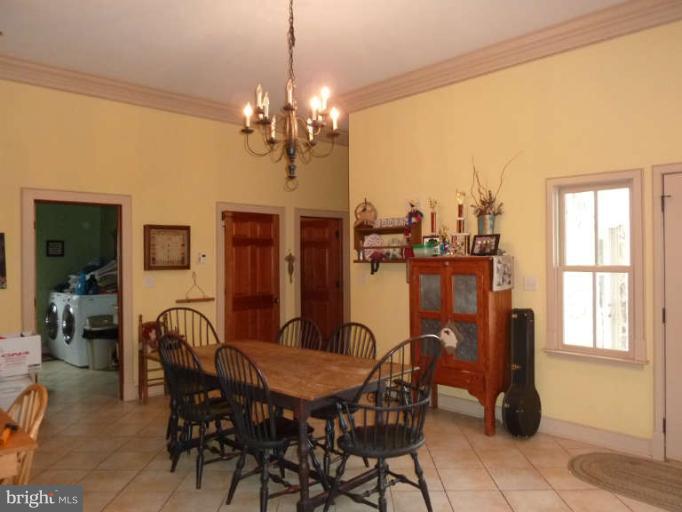 1003 Hiatt Road Winchester, VA 22603 - Photo 15 of 28 a view of a dining room with furniture window and outside view