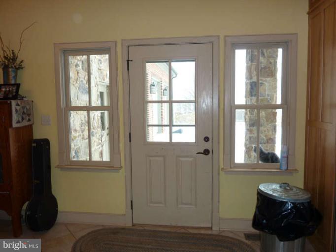 1003 Hiatt Road Winchester, VA 22603 - Photo 16 of 28 a living room with furniture and two window