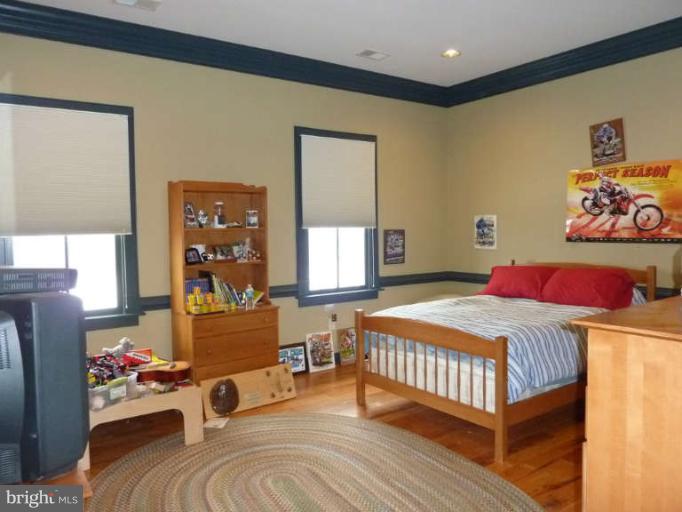 1003 Hiatt Road Winchester, VA 22603 - Photo 20 of 28 a bedroom with a bed and a window