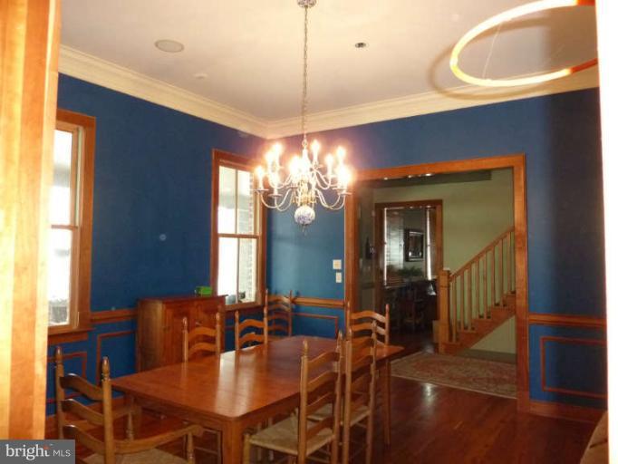 1003 Hiatt Road Winchester, VA 22603 - Photo 5 of 28 a view of a dining room with furniture and window
