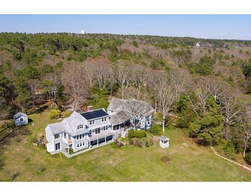67 Towhee Road Wareham, MA 02571 - Photo 5 of 30 a view of a house with a yard and lake