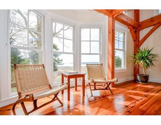 67 Towhee Road Wareham, MA 02571 - Photo 10 of 30 a living room filled with furniture and a table
