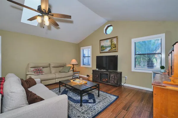 a kitchen with stainless steel appliances granite countertop a stove and a microwave