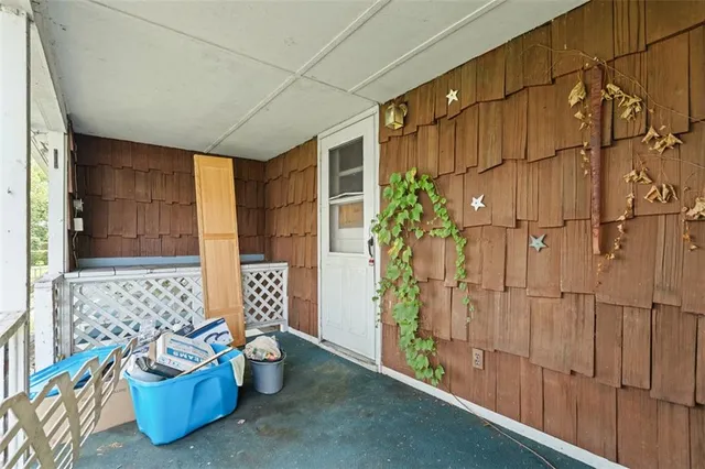 a bathroom with a toilet and shower