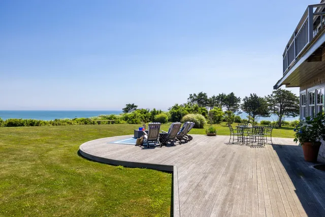a view of a patio with swimming pool