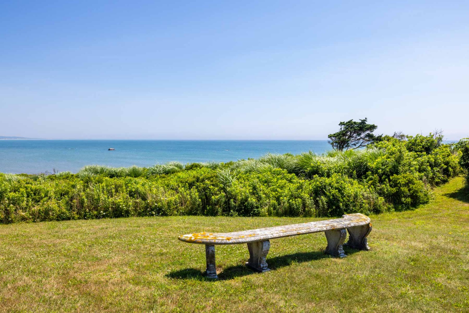 64 Squibnocket Farm Road Chilmark, MA 02535 - Photo 12 of 43 a view of a yard with an outdoor seating