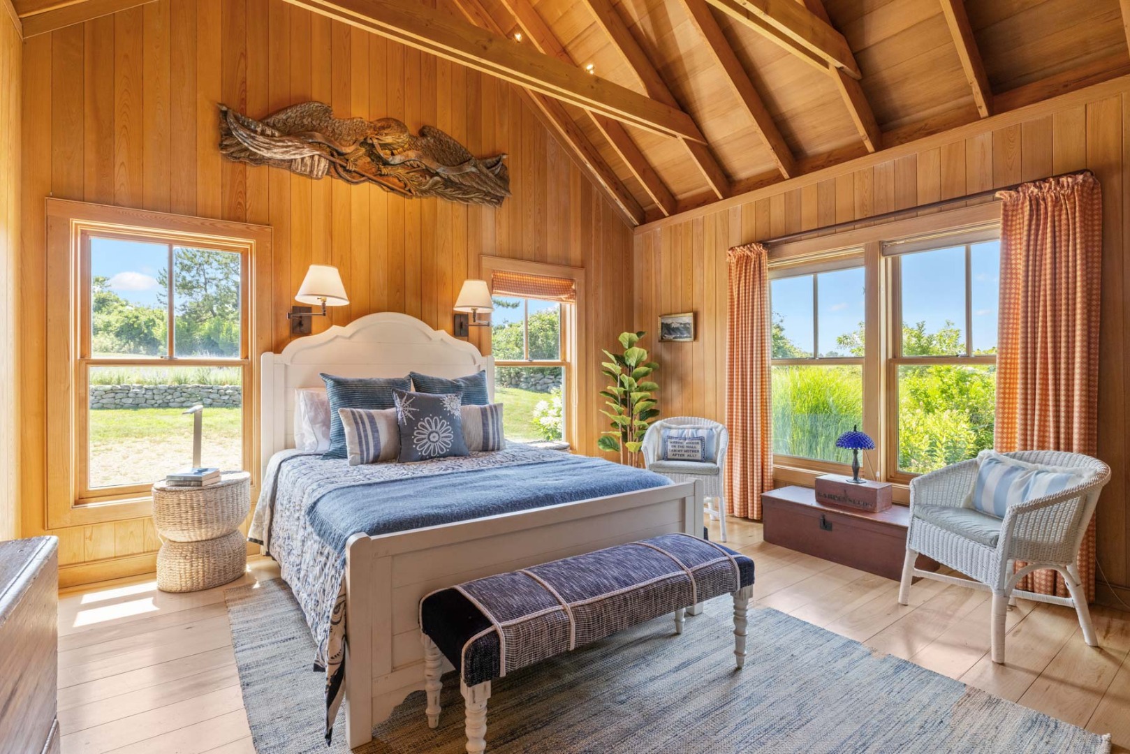 64 Squibnocket Farm Road Chilmark, MA 02535 - Photo 36 of 43 a bedroom with a bed chair and a large window