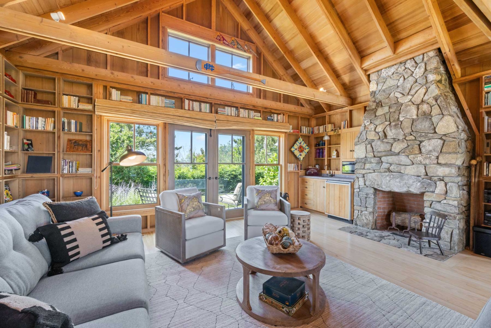 64 Squibnocket Farm Road Chilmark, MA 02535 - Photo 38 of 43 a living room with furniture and a fireplace