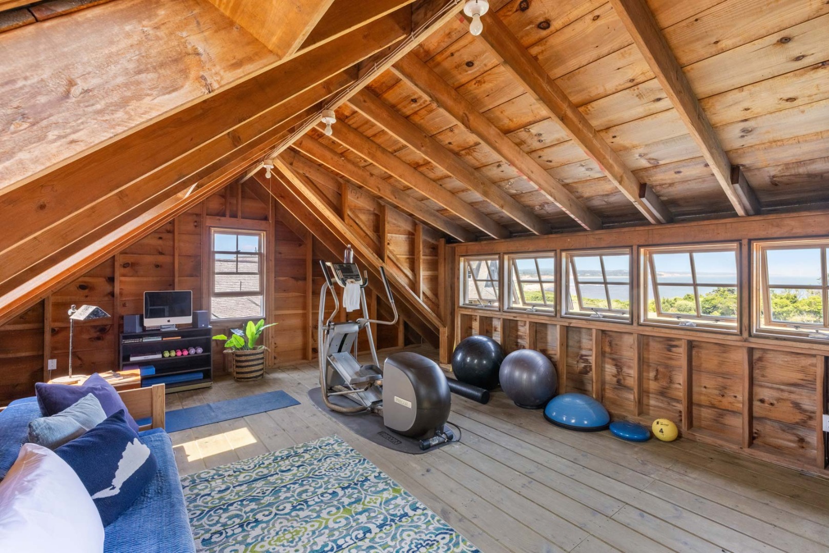 64 Squibnocket Farm Road Chilmark, MA 02535 - Photo 41 of 43 a room with lots of furniture and a rug