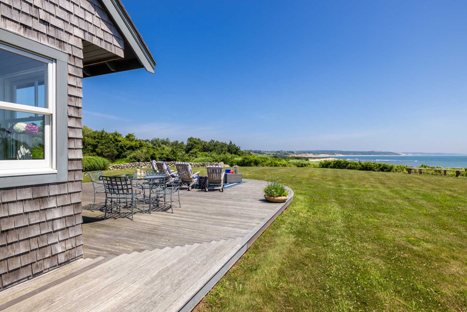 64 Squibnocket Farm Road Chilmark, MA 02535 - Photo 8 of 43 a view of a swimming pool with a patio