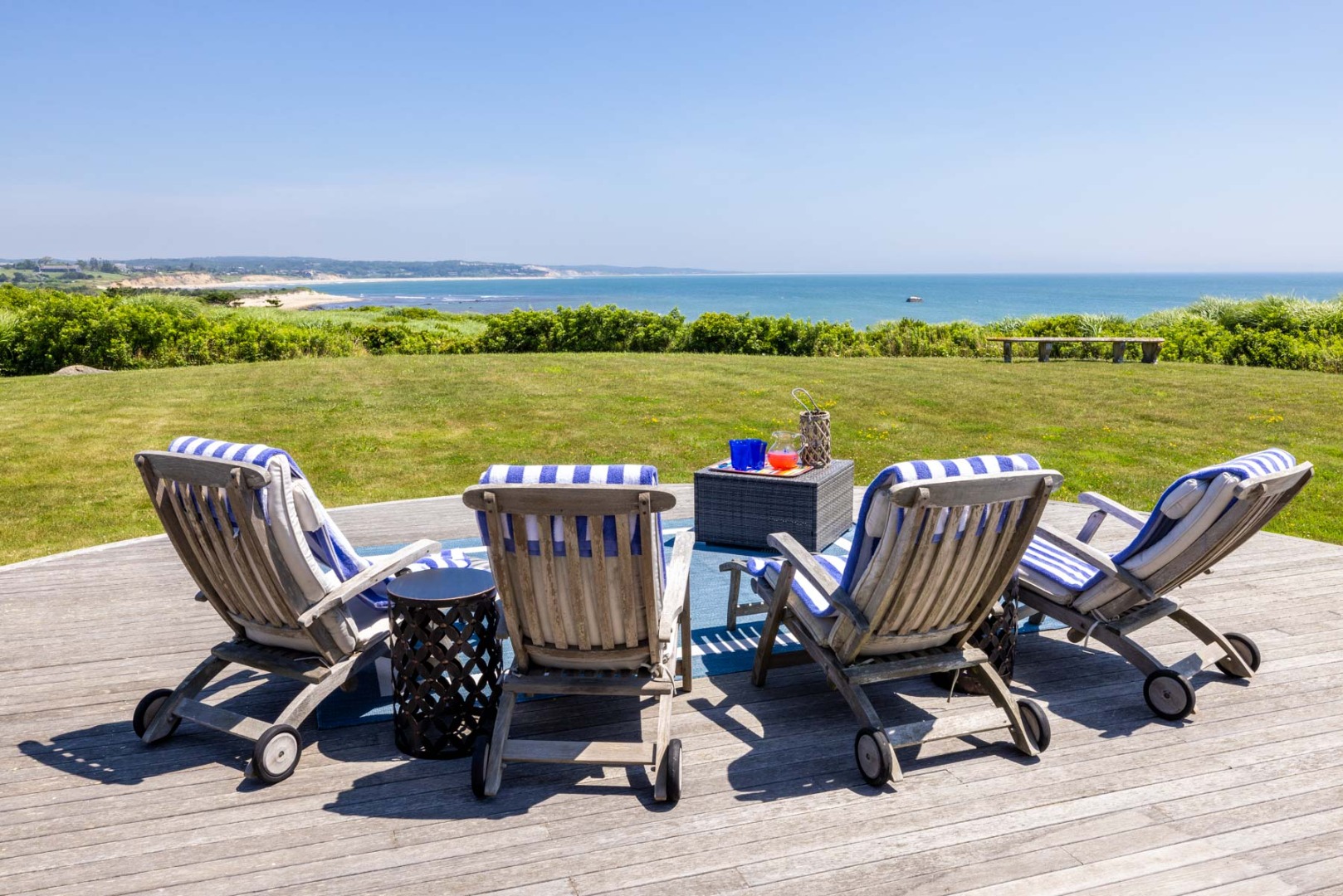 64 Squibnocket Farm Road Chilmark, MA 02535 - Photo 10 of 43 a view of a chairs and table on the terrace