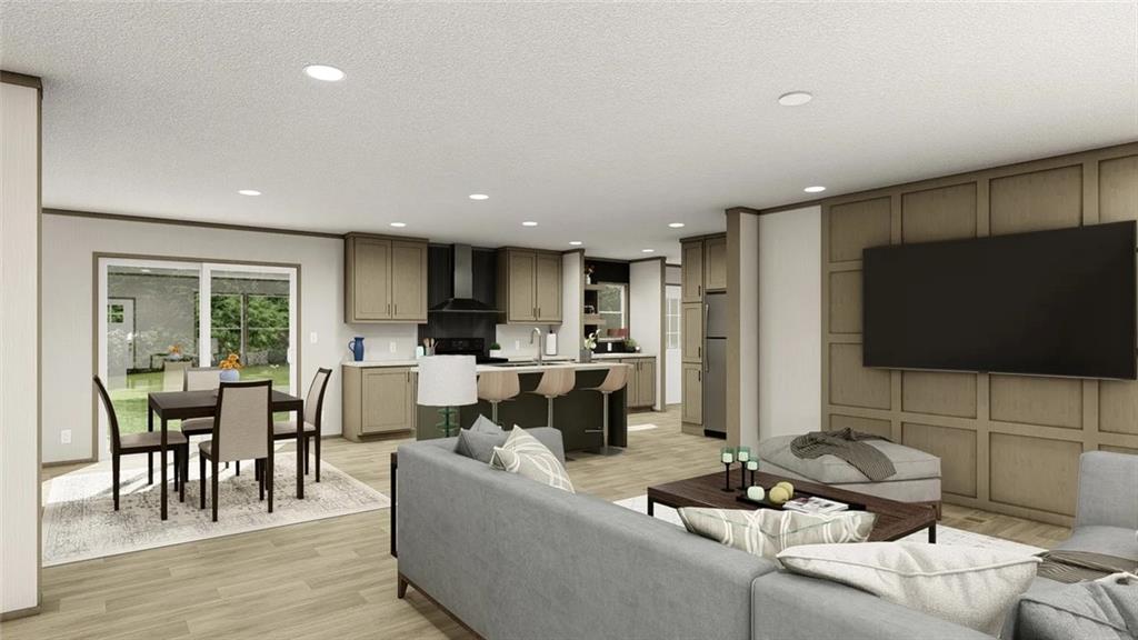 7463 Yukon Road Talking Rock, GA 30175 - Photo 3 of 5 a living room with furniture and a flat screen tv