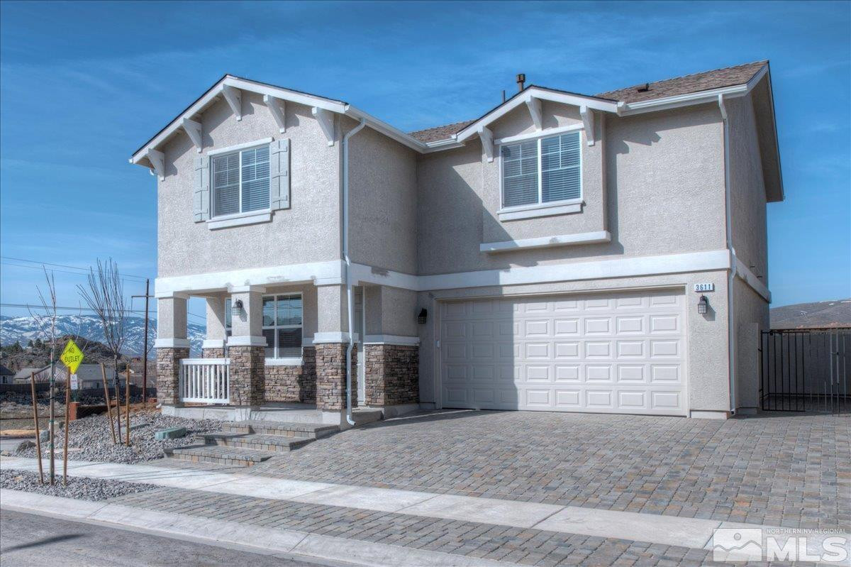 1164 Arrastra Road, Unit LOT 19 Reno, NV 89512 - Photo 1 of 34 a front view of a house with a yard