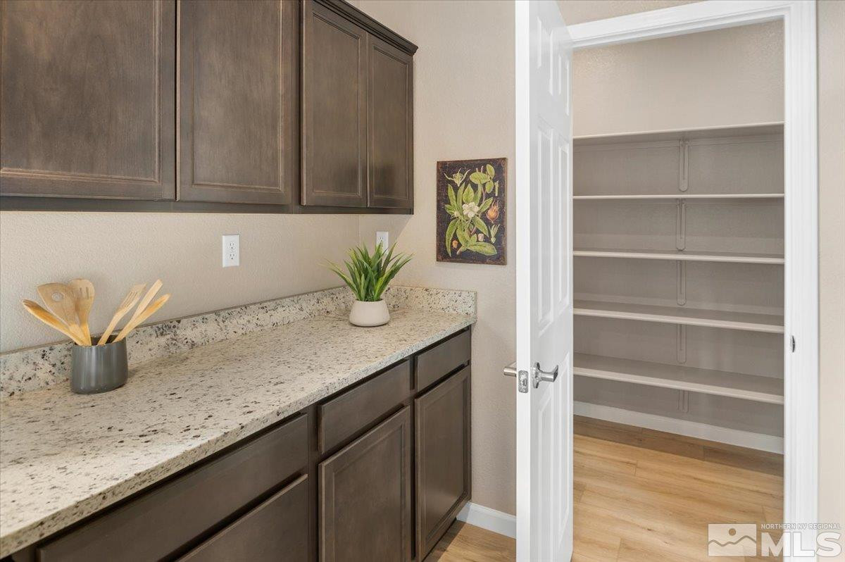 1164 Arrastra Road, Unit LOT 19 Reno, NV 89512 - Photo 15 of 34 a kitchen with a sink and cabinets