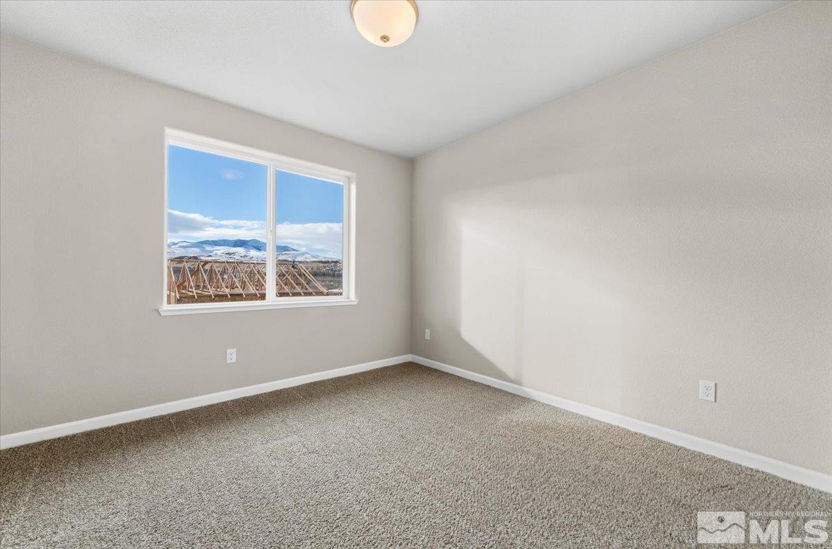 1164 Arrastra Road, Unit LOT 19 Reno, NV 89512 - Photo 27 of 34 an empty room with windows