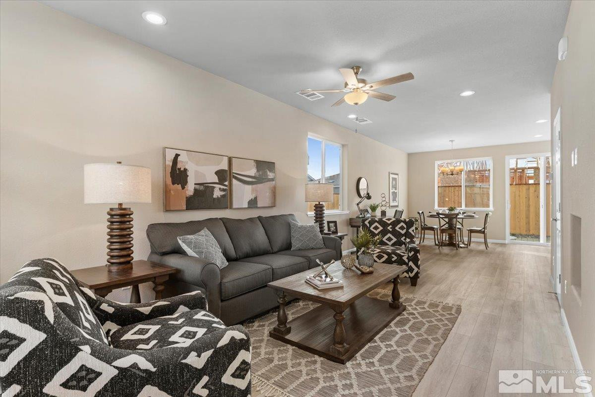 1164 Arrastra Road, Unit LOT 19 Reno, NV 89512 - Photo 5 of 34 a living room with furniture and wooden floor